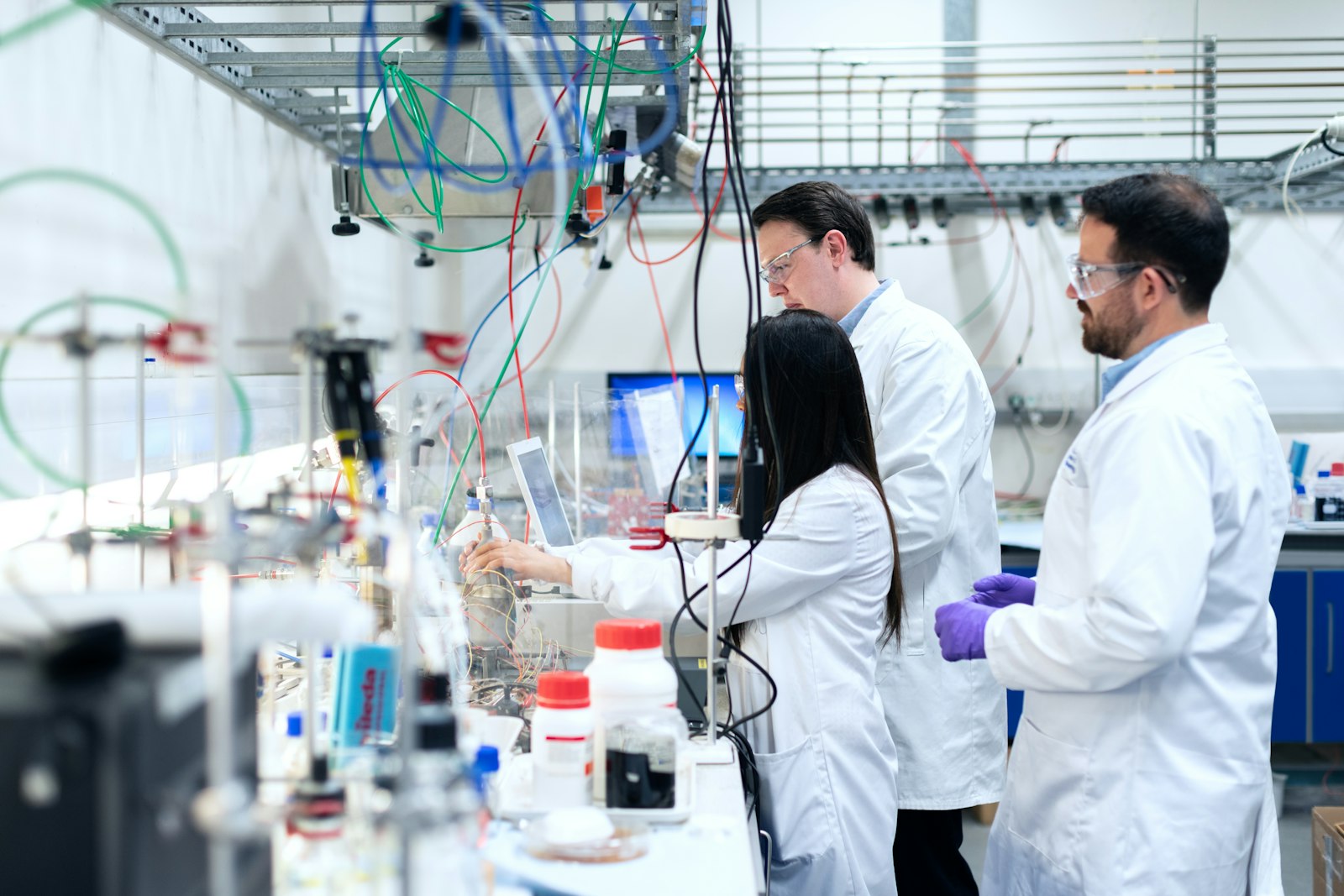 Scientists working together at a laboratory bench